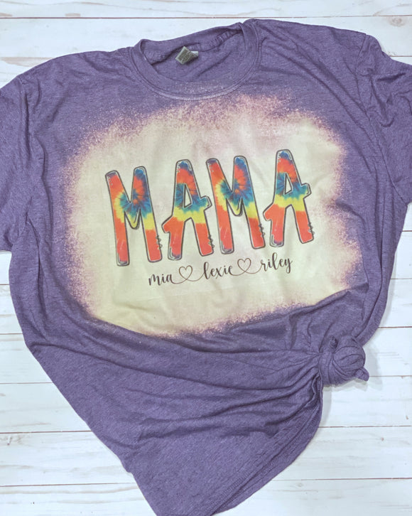 Mama tie dye name tee shown on bleached Heather purple