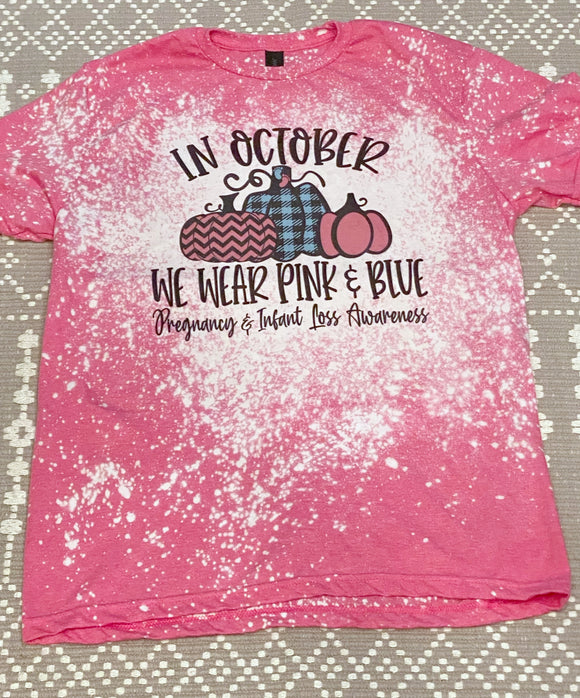 In October we wear pink and blue tee shirt
