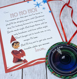 Double sided elf surveillance ornament with welcome back card