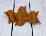 Tan leather bitty bow