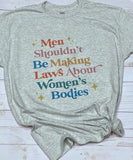 Men shouldn’t be making laws tee shirt shown on grey