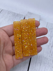 Orange glitter resin clip