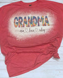 Mama tie dye name tee shown on bleached Heather purple